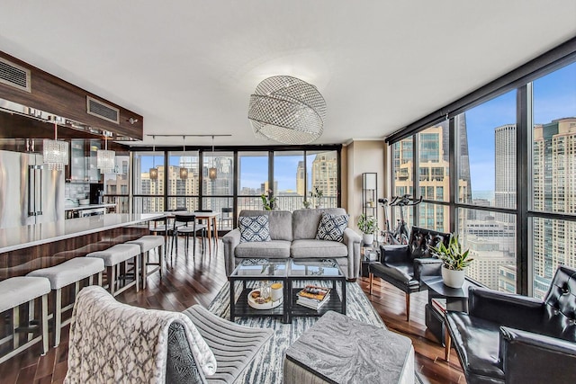 10 E Ontario St Unit 4808, Chicago, IL 60611 - sunroom featuring a skyline view and rail lighting