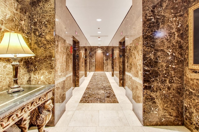 10 E Ontario St Unit 4808, Chicago, IL 60611 - hallway with tile walls and recessed lighting