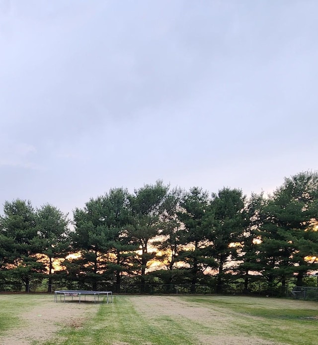 3883 E 2050th Rd, Serena, IL 60549 - view of green lawn featuring a trampoline