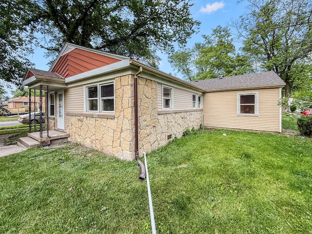 16802 Anthony Ave, Hazel Crest, IL 60429 - view of side of home with stone siding and a lawn