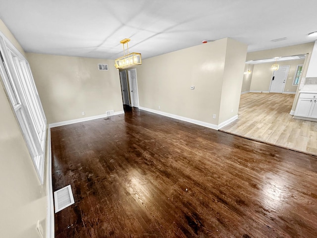 16802 Anthony Ave, Hazel Crest, IL 60429 - empty room with hardwood / wood-style flooring and baseboards