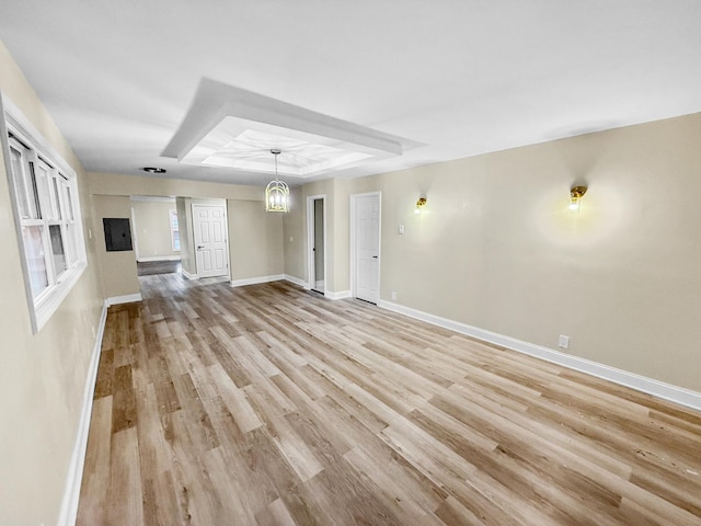 16802 Anthony Ave, Hazel Crest, IL 60429 - unfurnished living room with light wood-style flooring, electric panel, and a chandelier