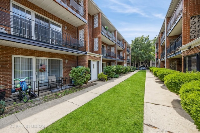 6255 S Mason Ave Unit 1B, Chicago, IL 60638 - view of property's community with a lawn