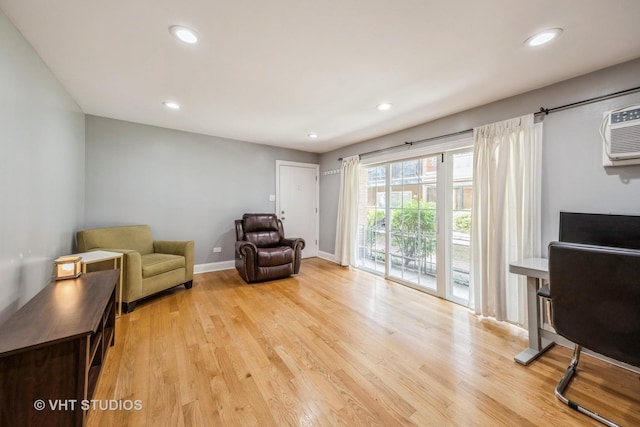 6255 S Mason Ave Unit 1B, Chicago, IL 60638 - living area with light wood-style floors, recessed lighting, and a wall mounted air conditioner
