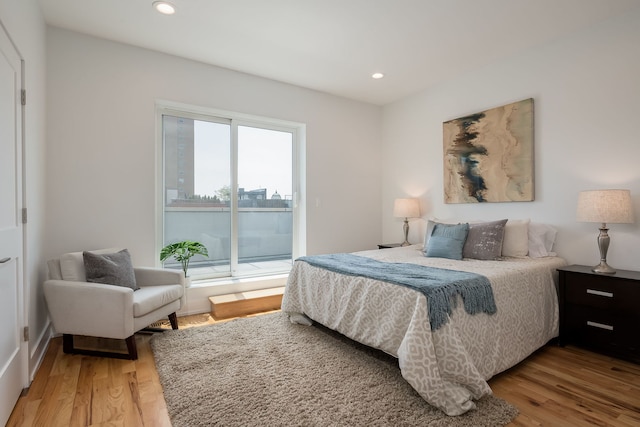 1415 W Walton St Unit 3, Chicago, IL 60642 - bedroom featuring access to outside, light wood-style floors, and recessed lighting