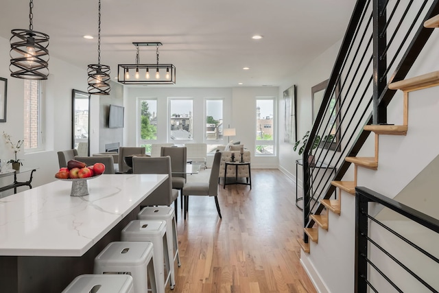 1415 W Walton St Unit 3, Chicago, IL 60642 - kitchen featuring light wood finished floors, healthy amount of natural light, recessed lighting, open floor plan, and pendant lighting