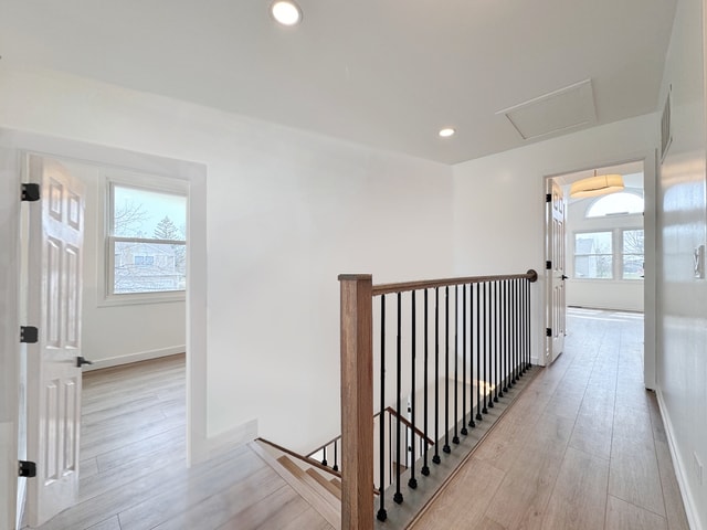 2326 Hamilton Pl, Schaumburg, IL 60194 - corridor featuring an upstairs landing, light wood-style flooring, attic access, and recessed lighting
