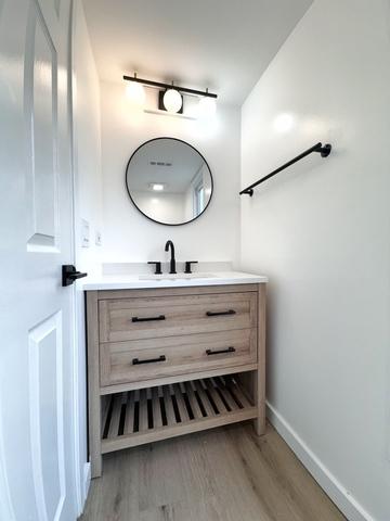 2326 Hamilton Pl, Schaumburg, IL 60194 - bathroom featuring vanity and wood finished floors