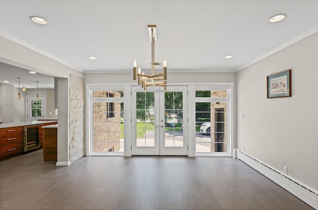 32 Greencroft Dr, Champaign, IL 61821 - unfurnished dining area featuring a baseboard radiator, french doors, healthy amount of natural light, wine cooler, and recessed lighting