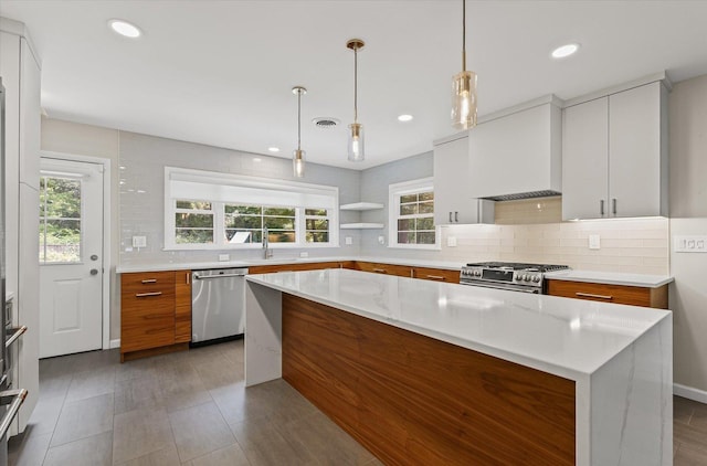 32 Greencroft Dr, Champaign, IL 61821 - kitchen with appliances with stainless steel finishes, modern cabinets, healthy amount of natural light, and recessed lighting