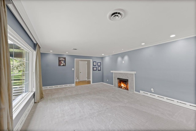 32 Greencroft Dr, Champaign, IL 61821 - unfurnished living room with a baseboard heating unit, a fireplace, carpet, crown molding, and recessed lighting