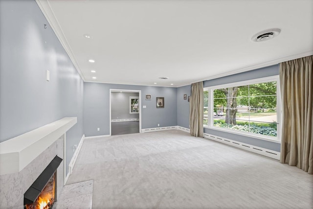 32 Greencroft Dr, Champaign, IL 61821 - unfurnished living room featuring baseboard heating, carpet flooring, a baseboard radiator, ornamental molding, and a high end fireplace