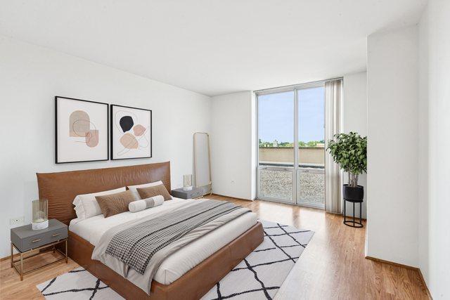 1640 Maple Ave Unit 503, Evanston, IL 60201 - bedroom with access to outside, light wood-style floors, and floor to ceiling windows