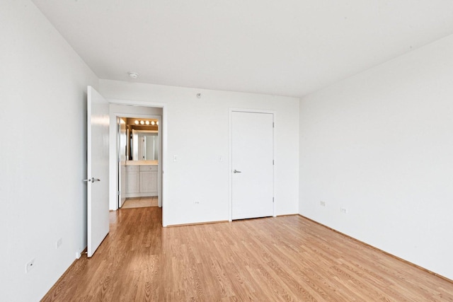1640 Maple Ave Unit 503, Evanston, IL 60201 - unfurnished bedroom featuring light wood-type flooring