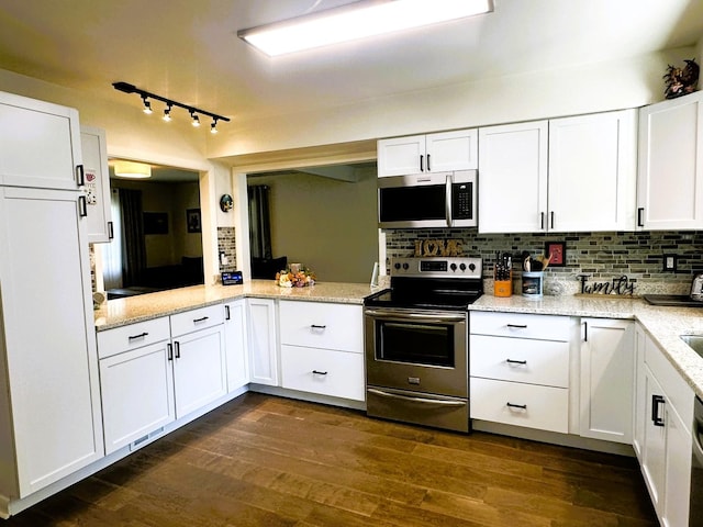 1517 Juniper Ln, Machesney Park, IL 61115 - kitchen featuring stainless steel appliances, backsplash, white cabinets, dark wood-style floors, and light stone countertops