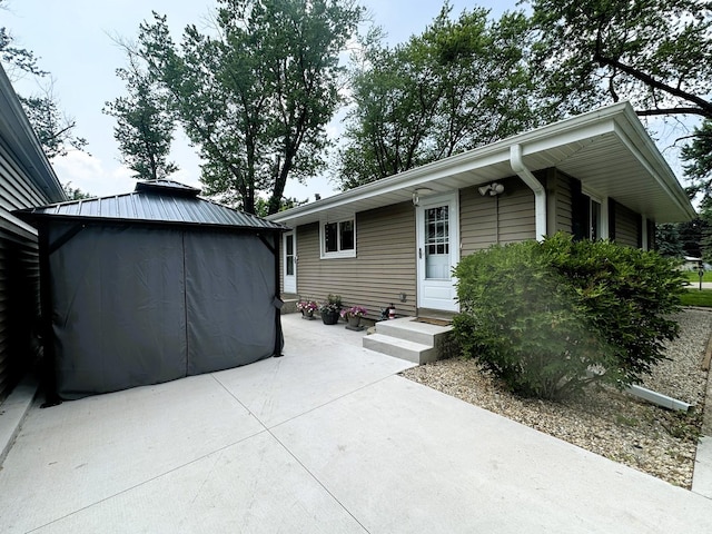 1517 Juniper Ln, Machesney Park, IL 61115 - view of front facade with a gazebo
