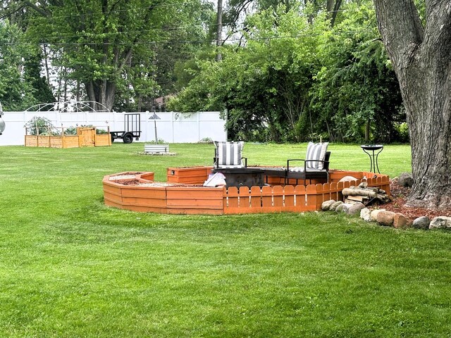 1517 Juniper Ln, Machesney Park, IL 61115 - view of yard with a fire pit and view of scattered trees
