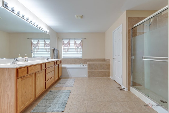 337A Veronica Cir, Bartlett, IL 60103 - full bath with tile patterned floors, a bath, a stall shower, and double vanity