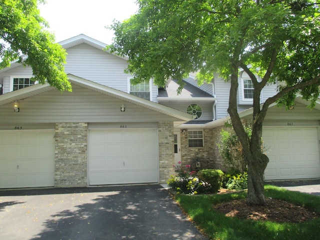 865 N Tamarac Blvd, Addison, IL 60101 - view of front of house featuring asphalt driveway