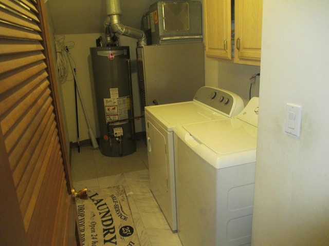 865 N Tamarac Blvd, Addison, IL 60101 - laundry area featuring gas water heater, separate washer and dryer, cabinet space, and light tile patterned floors