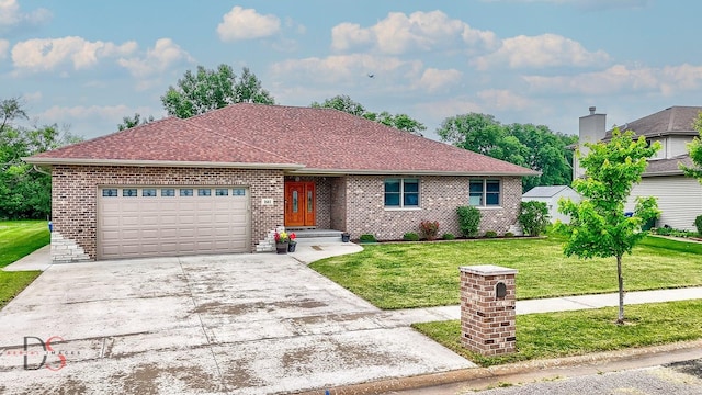 1661 Locust Rd, Morris, IL 60450 - ranch-style home featuring an attached garage, a front lawn, brick siding, and concrete driveway