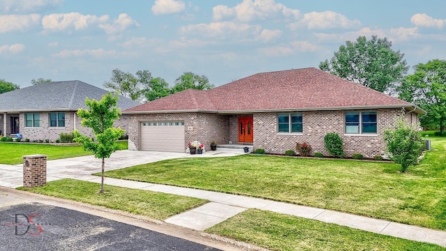 1661 Locust Rd, Morris, IL 60450 - ranch-style house featuring brick siding, a front lawn, a garage, and driveway