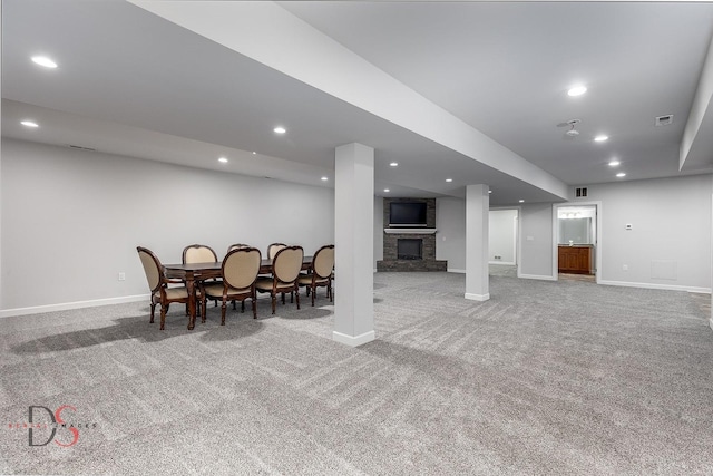 1661 Locust Rd, Morris, IL 60450 - finished basement featuring carpet floors, a large fireplace, and recessed lighting