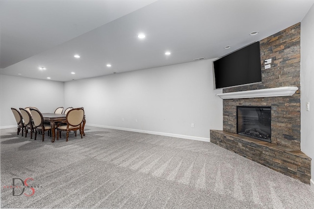 1661 Locust Rd, Morris, IL 60450 - dining area with carpet floors, recessed lighting, and a stone fireplace