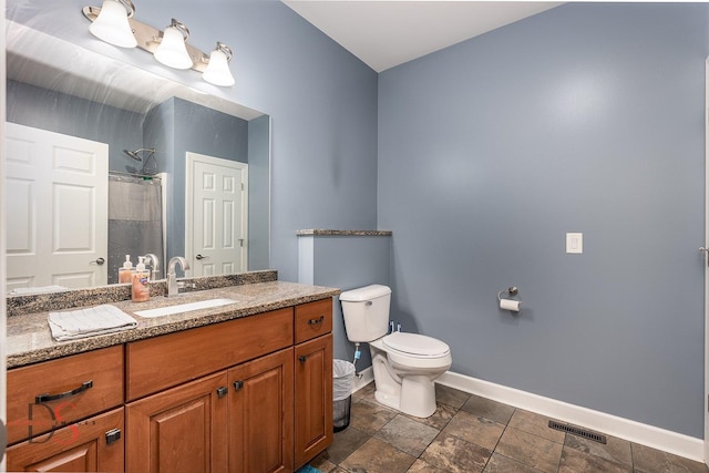 1661 Locust Rd, Morris, IL 60450 - bathroom featuring vanity, a shower with shower curtain, and stone finish flooring