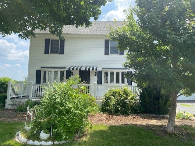 207 N Putnam St, Lostant, IL 61334 - view of front of house featuring a wooden deck