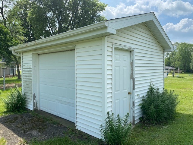 207 N Putnam St, Lostant, IL 61334 - detached garage featuring dirt driveway