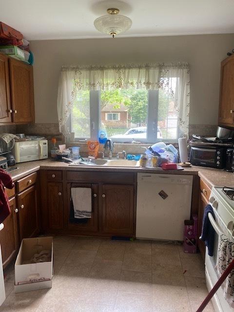 440 W Parkview Ter, Algonquin, IL 60102 - kitchen with white appliances, plenty of natural light, and light countertops