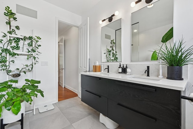 949 W Montana St Unit 3W, Chicago, IL 60614 - full bathroom featuring double vanity, tile patterned floors, and backsplash