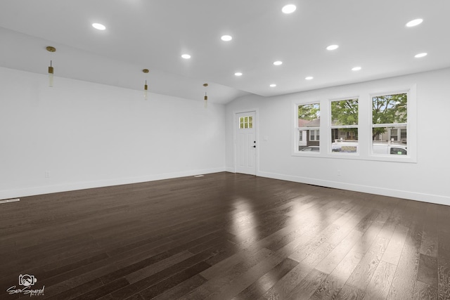 7227 S Paulina St, Chicago, IL 60636 - unfurnished room with dark wood-style flooring, recessed lighting, and vaulted ceiling