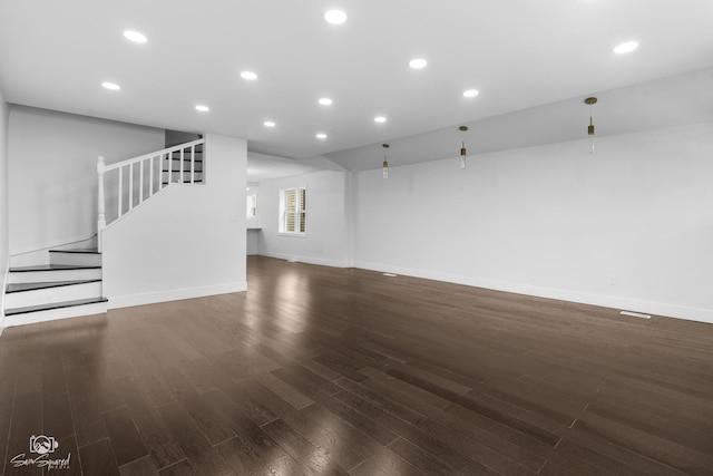 7227 S Paulina St, Chicago, IL 60636 - unfurnished living room with wood finished floors, stairs, and recessed lighting