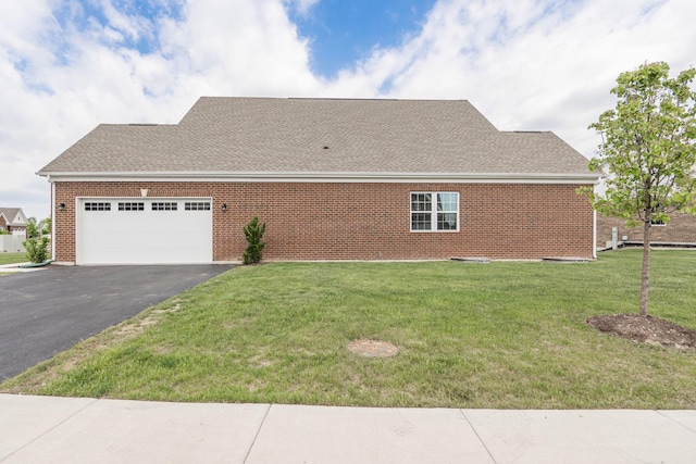 2107 Traemore Ln, New Lenox, IL 60451 - view of property exterior featuring driveway, an attached garage, a lawn, a shingled roof, and brick siding