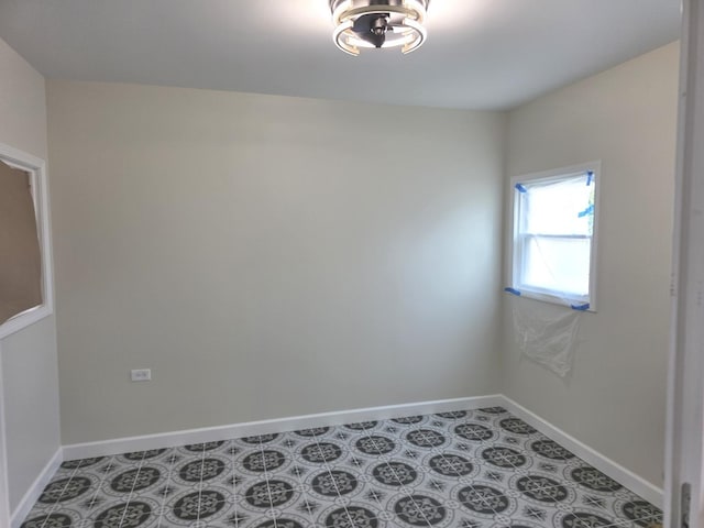 1449 Kristan Ave, North Chicago, IL 60064 - spare room featuring baseboards