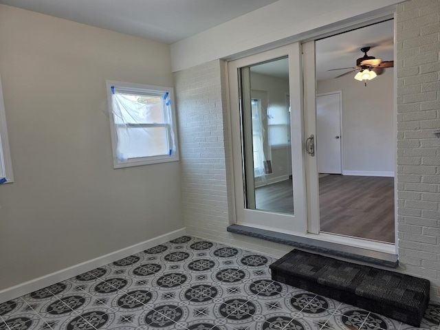 1449 Kristan Ave, North Chicago, IL 60064 - unfurnished room with baseboards and a ceiling fan