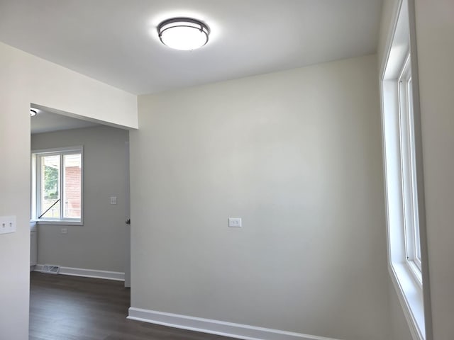 1449 Kristan Ave, North Chicago, IL 60064 - empty room with baseboards and dark wood-style floors