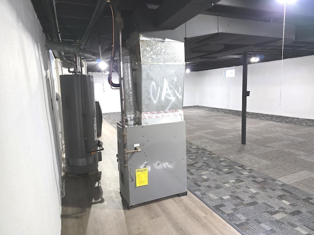 1449 Kristan Ave, North Chicago, IL 60064 - basement featuring gas water heater and heating unit