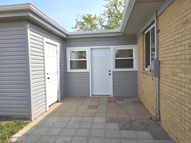 1449 Kristan Ave, North Chicago, IL 60064 - view of exterior entry featuring brick siding