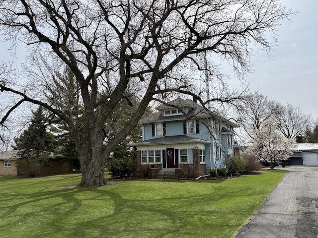 1112 W Wilmington-Peotone Rd, Peotone, IL 60468 - traditional style home featuring a front lawn, a chimney, and brick siding