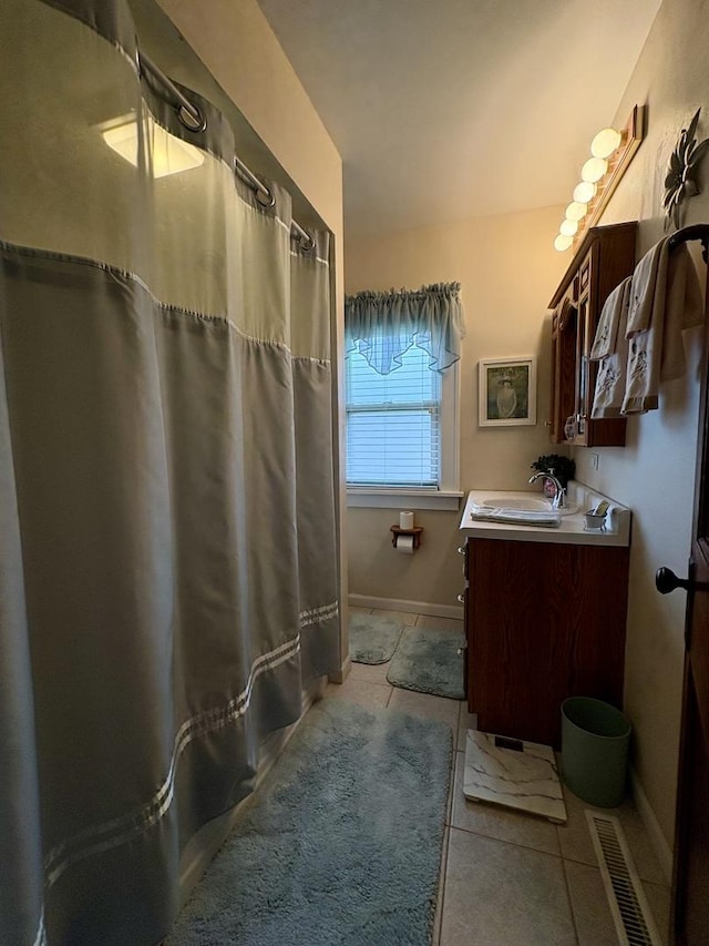 1112 W Wilmington-Peotone Rd, Peotone, IL 60468 - bathroom featuring vanity, tile patterned floors, and curtained shower