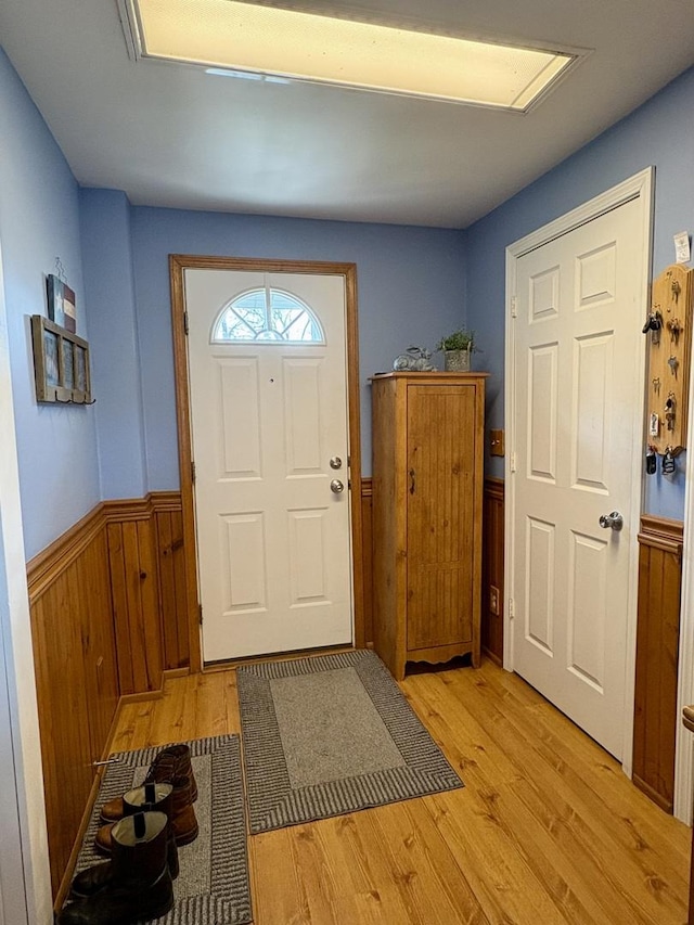 1112 W Wilmington-Peotone Rd, Peotone, IL 60468 - foyer entrance with wainscoting and light wood-style floors