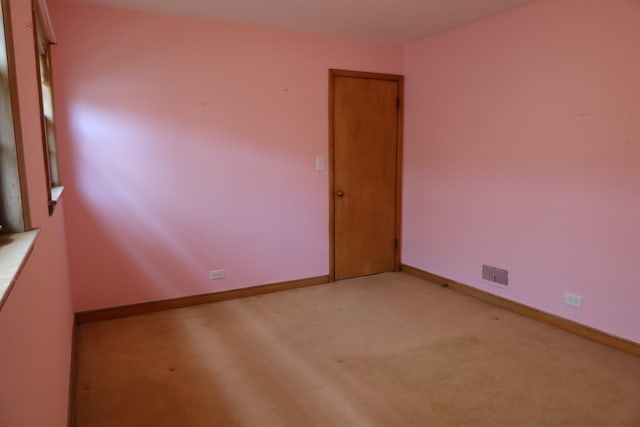 10132 S Fairfield Ave, Chicago, IL 60655 - empty room with light carpet and baseboards