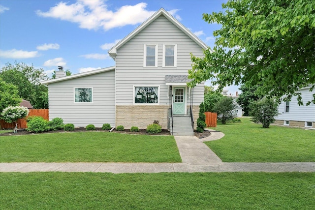 103 S Locust St, Loda, IL 60948 - view of front of house featuring entry steps, a chimney, and stone siding