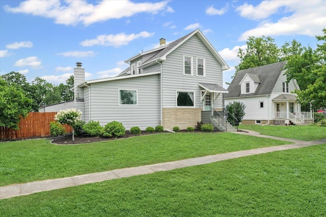 103 S Locust St, Loda, IL 60948 - view of side of property featuring a chimney and stone siding