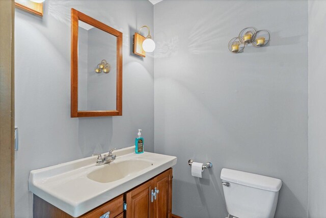 103 S Locust St, Loda, IL 60948 - bathroom with toilet and vanity