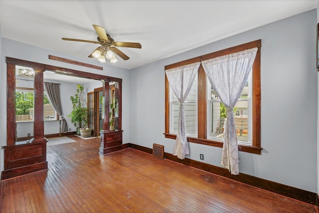 103 S Locust St, Loda, IL 60948 - empty room with hardwood / wood-style floors and ceiling fan