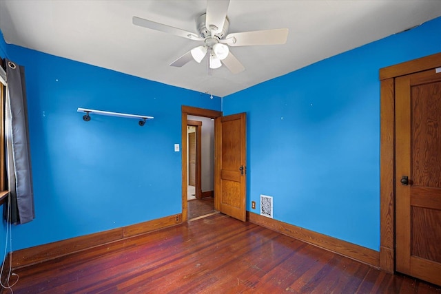103 S Locust St, Loda, IL 60948 - unfurnished bedroom featuring wood finished floors and ceiling fan